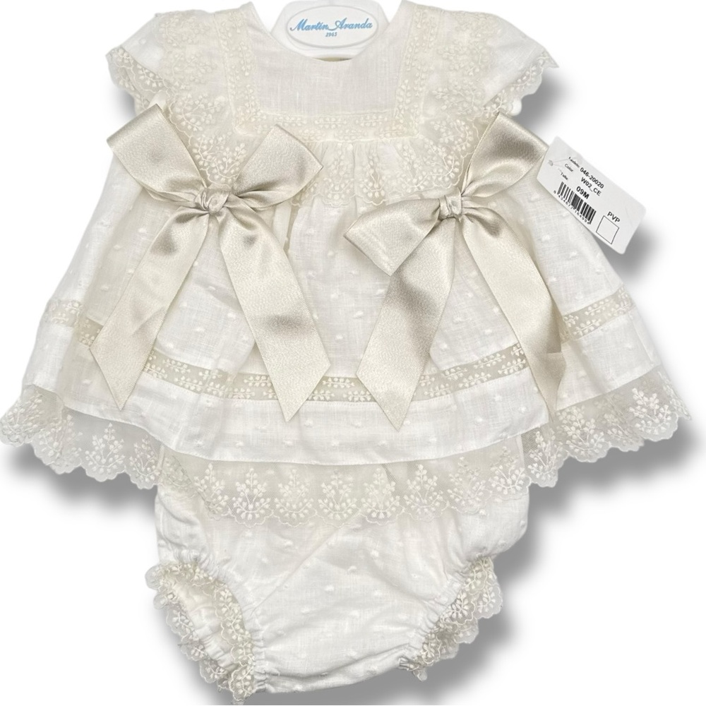Martin Aranda white dress with bows 9 months